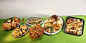 Several platters of sweet and savoury snacks