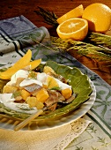 Fruity herring salad with mango, orange & cream dressing
