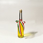 Olive oil in bottle with Italian bow