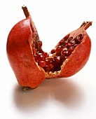 A pomegranate, cut into two halves
