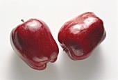 Two Washington Red Delicious apples, from the USA