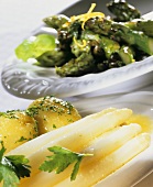 White asparagus with butter sauce; green asparagus with capers