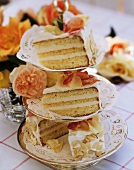 Rose cake with wine cream & rose petals on etagere, cut