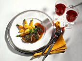 Hare back with herb coating, carrots, potatoes; Red wine