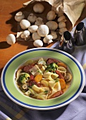 Pasta stew with cabanossi, vegetables and mushrooms
