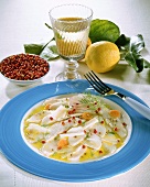 Cod carpaccio with cranberries and Parmesan shavings
