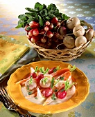 Fricassee of spring vegetables; Radishes in a basket