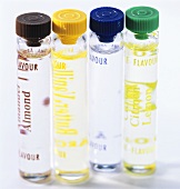 Various flavouring bottles (almond, lemon, vanilla)
