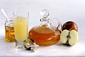 Apple vinegar, apples, honey and apple blossom