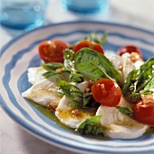 Spinach and tomatoes on mozzarella