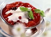 Berry compote with vanilla cream and lemon balm