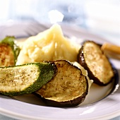 Aubergines and courgettes with creamed potato