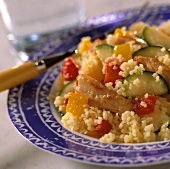 Couscous stir-fry with chicken breast, courgettes and pepper