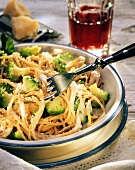Spaghetti with broccoli and parmesan; red wine glass