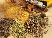 Various spices for baking bread, and cane sugar