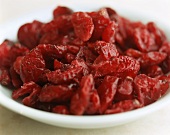Dried cranberries on white plate