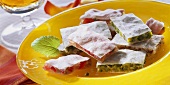 White nut squares with pistachios and cherries