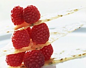 Fresh raspberries between sheets of anise filo pastry