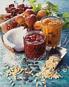 Cherry jam with coconut and apricot jam with almonds
