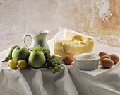 Still life with butter, flour, eggs and fruit