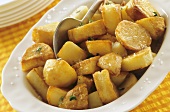 Fried potatoes, sprinkled with coarse salt