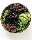 Green and red grapes in a basket