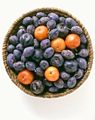 Plums and damsons in a basket