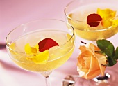 Punch with roses in two champagne bowls