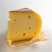 A piece of Gouda on paper