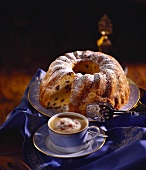 Vanilla gugelhupf with chocolate pieces; coffee