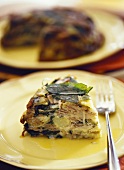 A piece of pasta cake (pizzoccheri) with chard & sage