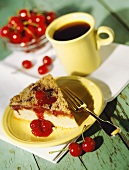 Cheesecake with cherries and a cup of coffee