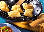 Fried cod fillets from the wok