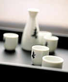 Japanese sake in bowl and jug