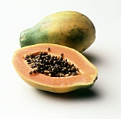 Whole and half papaya