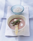 Red onion cream soup with sour cream and chives
