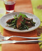 Lamb fillets with mangetouts and mint
