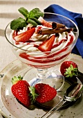 Marbled strawberry quark with chocolate fan in dessert glass