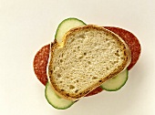 Salami and sliced cucumber sandwich