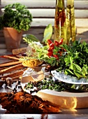 Still life with fresh herbs, spices and oil