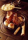 Knuckle of pork with bacon dumplings and sauerkraut