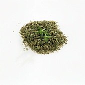 Thyme, fresh and dried, on a white background