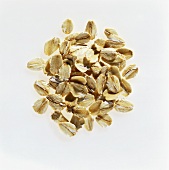 Rolled oats on a white background