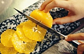 Slicing oranges
