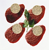 Four beef fillets with herb butter