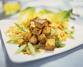 Couscous with curried tofu and spring onions