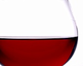 Half-full red wine glass (close-up)