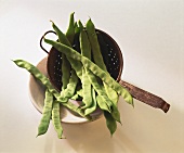 Green beans in sieve in a dish (runner beans)
