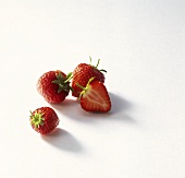 A few strawberries on white background