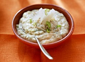 Parmesan mayonnaise with spring onions in bowl